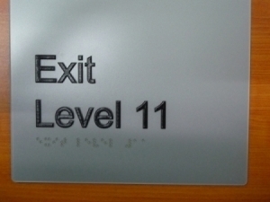 buy braille exit sign australia