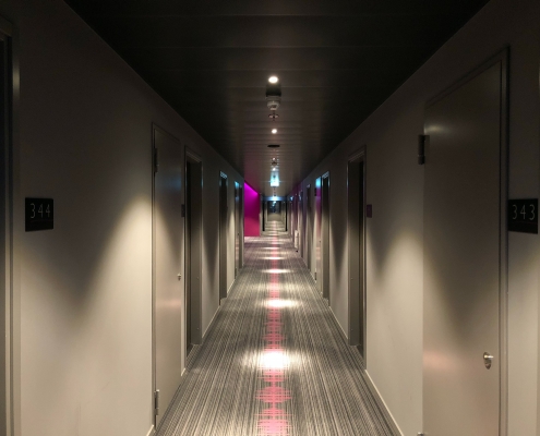 Hotel Passage with Signs